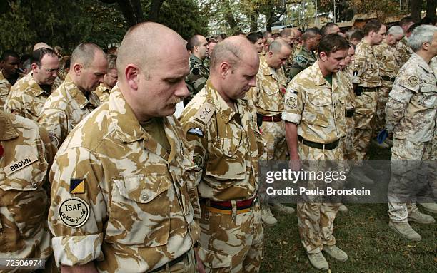 British ISAF troops observe a moment of silence to honor their war veterans on Armistice Day ceremony on November 11, 2006 in Kabul, Afghanistan....