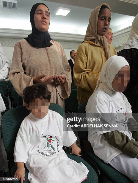 Asma and Khaoula victims of a pedophile, attend with their mothers a meeting gathering several groups including Moroccan association "Ne touche pas a...