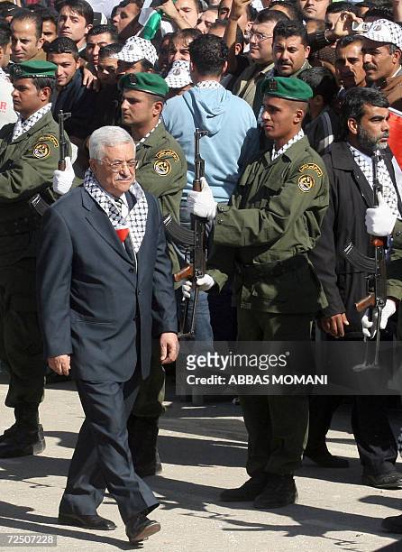 Palestinian President Mahmud Abbas arrives at a ceremony commemorating the second anniversary of Yasser Arafat's death, 11 November 2006 in the West...