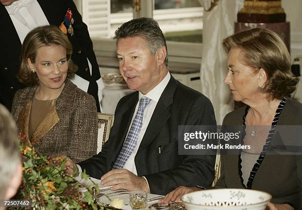 Princess Mathilde FA Minister Karel De Gucht and Quee Paola have lunch at the Laeken Castle November 11, 2006 in Brussels, Belgium.