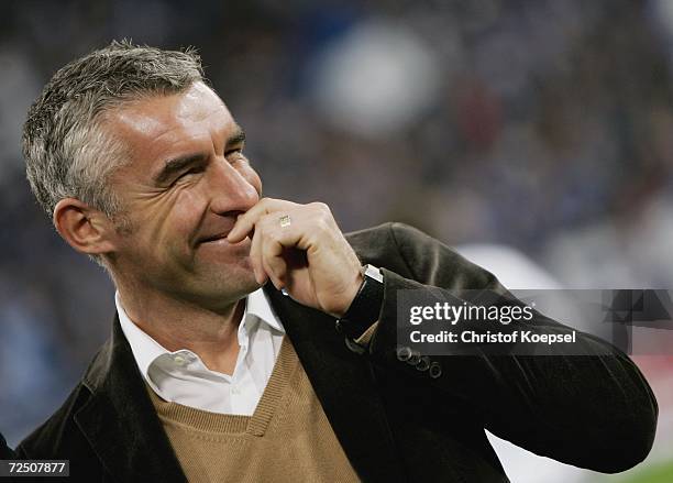 Head coach Mirko Slomka of Schalke smiles during the Bundesliga match between Schalke 04 and FSV Mainz 05 at the Veltins Arena on November 11, 2006...