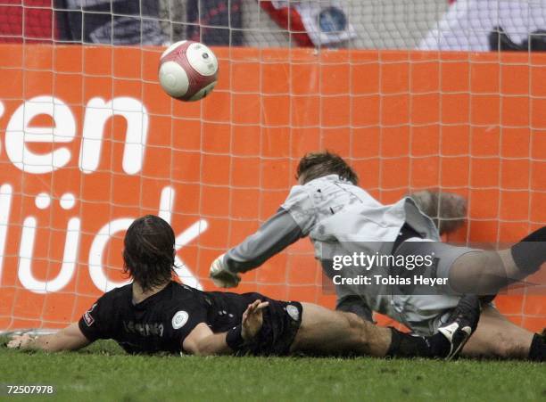 St. Paulis Florian Lechner scores an own goal while goalkeeper Patrik Borger tries to save during the Third League match between Fortuna Dusseldorf...