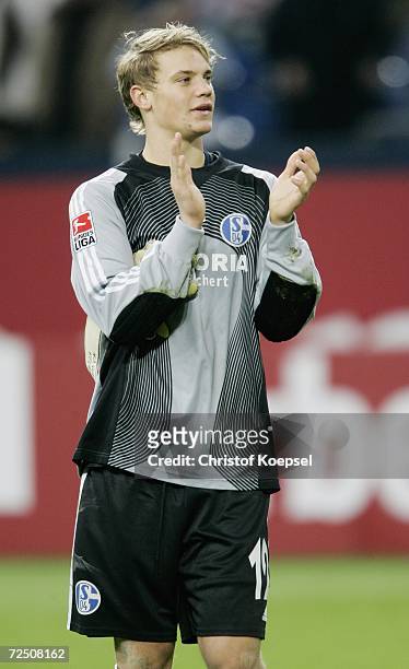 Manuel Neuer of Schalke celebreates the 4-0 victory of during the Bundesliga match between Schalke 04 and FSV Mainz 05 at the Veltins Arena on...