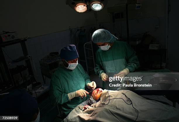 Doctor Olfat Hashimi and nurse Nazia Loudin operate on Marzia, to reconstruct her nose and lips at a special clinic to help cleft lip and palate...