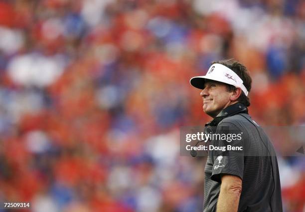Head coach Steve Spurrier of the South Carolina Gamecocks looks back over his shoulder at a replay in the second quarter against his former team, the...