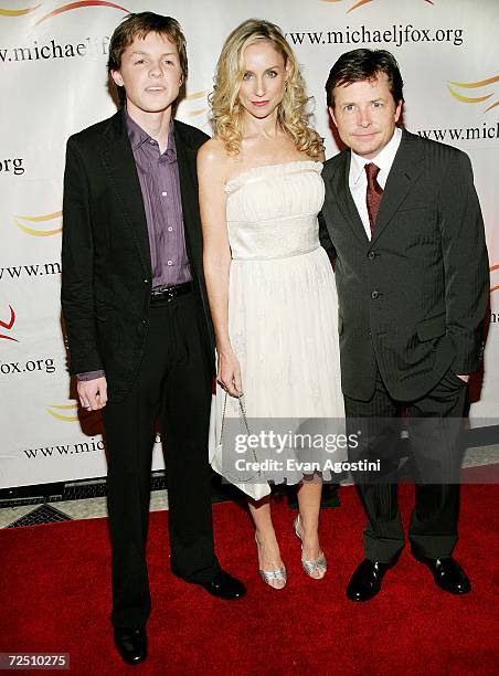 Actor Michael J. Fox with his wife actress Tracy Pollan and son Sam arrive for "A Funny Thing Happened On The Way To Cure Parkinson's" benefit gala...