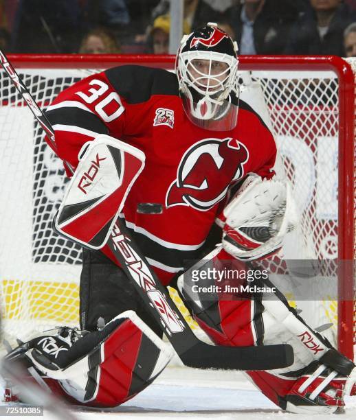 Martin Brodeur of the New Jersey Devils makes a save against the Florida Panthers on November 11, 2006 at Continental Airlines Arena in East...