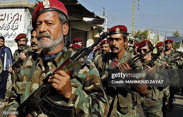 Lebanon: Members of Palestinian Fatah movement Armed Struggle parade in their Ain al-Hilweh refugee camp in the Lebanese southern port city if Sidon,...