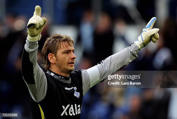 Goalkeeper Georg Koch celebrates the first goal of Klemen Lavric during the Second Bundesliga match between MSV Duisburg and FC Augsburg at the MSV...