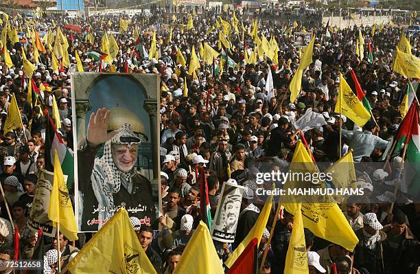 Palestinian Fatah supporters attend a rally marking the anniversary of the death of veteran Palestinian leader Yasser Arafat in Gaza City 12 November...