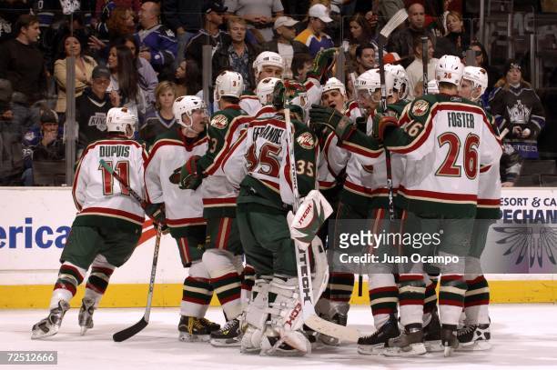 Minnesota Wild players celebrate their 3-2 shoot out win against the Los Angeles Kings at the Staples Center November 11, 2006 in Los Angeles,...