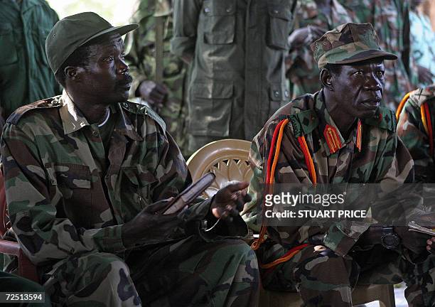 The leader of the Lord's Resistance Army, Joseph Kony and his deputy Vincent Otti sit inside a tent 12 November at Ri-Kwamba in Southern Sudan during...