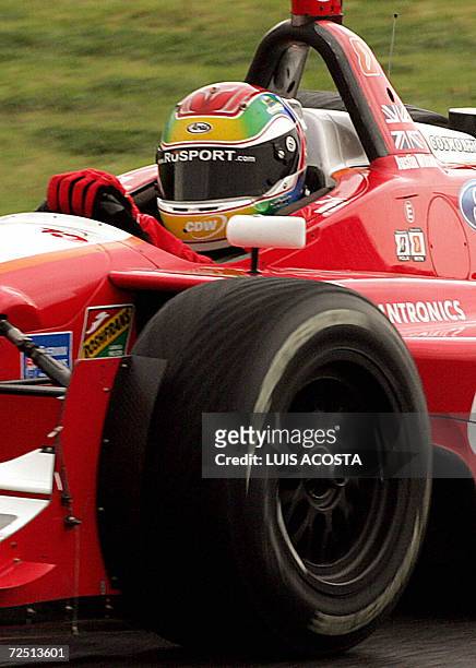 English driver pole man Justin Wilson, of the RusPort Racing team, steers his car during the warm-up session of the Champ Car World Series GP in...