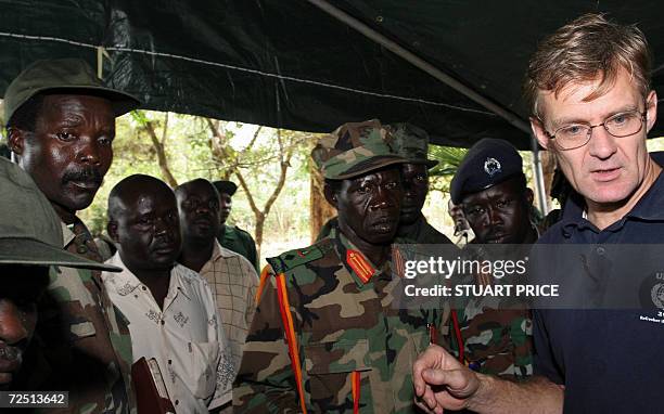 The leader of the Lord's Resistance Army, Joseph Kony and his deputy Vincent Otti discuss with UN humanitarian chief Jan Egeland 12 November at...