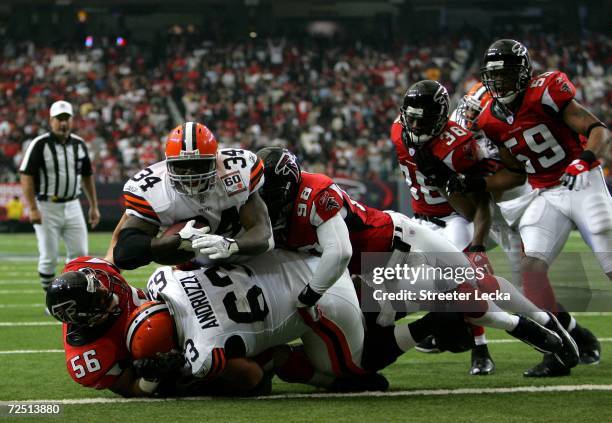 Reuben Droughns of the Cleveland Browns dives into the end zone for a touchdown against the Atlanta Falcons during their game at the Georgia Dome...