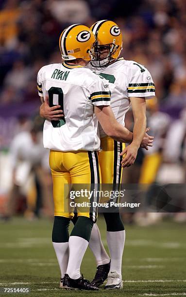 Place kicker Dave Rayner of the Green Bay Packers is congratulated by Jon Ryan after his 29 yard fourth quarter field goal against the Minnesota...