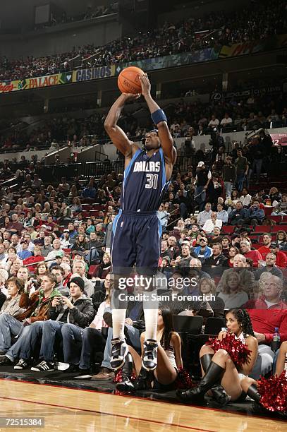 Jason Terry of the Dallas Mavericks shoots a three during a game against the Portland Trail Blazers on November 12, 2006 at the Rose Garden Arena in...