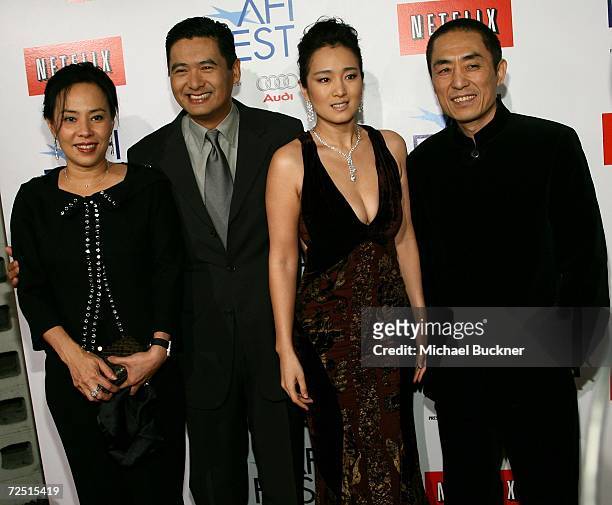 Jasmine Chow, actor Chow Yun Fat, actress Gong Li and director Zhang Yimou arrive for the closing night gala presentation of the film "Curse of the...