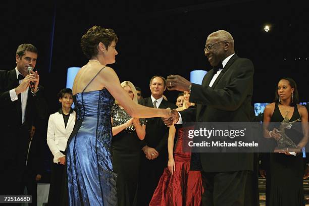 Zola Budd of South Africa is invited on stage by Lamine Diack, President of the IAAF in a gesture of reconcilliation, after Diack refused to present...