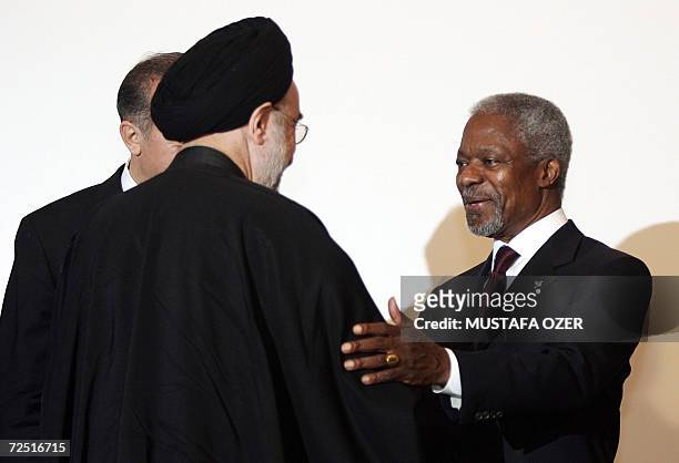 United Nations Secretary General Kofi Annan talks with former Iranian president Seyyed Mohammad Khatami 13 November 2006, during a meeting of the...
