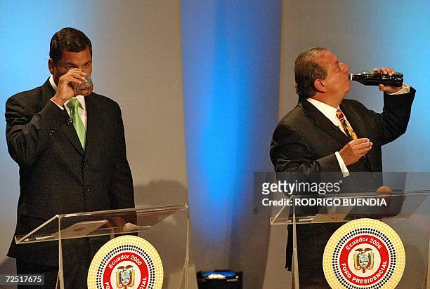 Ecuadorean presidential candidates Rafael Correa and Alvaro Noboa pause during a televised debate with the two other main candidates Leon Roldos and...