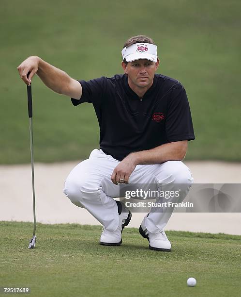 Retief Goosen, Captain of the International team lines up his putt during the first day of The Goodwill Trophy at Mission Hills Golf Club on November...