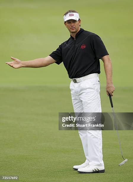Retief Goosen, Captain of the International team gestures during the first day of The Goodwill Trophy at Mission Hills Golf Club on November 13 in...