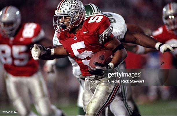 Running back Michael Wiley of the Ohio State Buckeyes runs with the ball during a game against the Michigan State Spartans at the Ohio Stadium in...