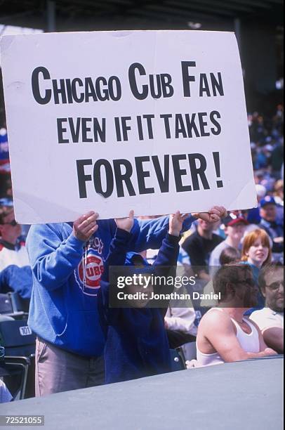 General view of fans holding a banner during a game between the San Francisco Giants and the Chicago Cubs at Wrigley Field in Chicago, Illinois. The...