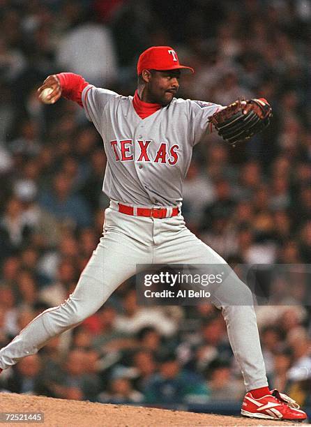 Pitcher Ken Hill of the Texas Rangers throws a pitch during the 1st inning of game two of the American League Division series versus the New York...