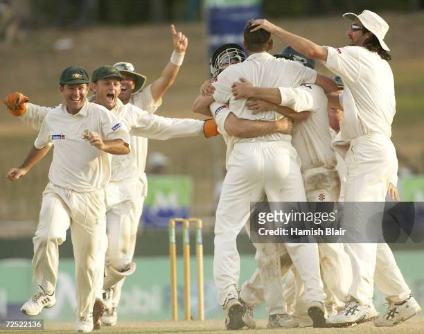 The Australians celebrate their 3 - 0 series win after the final wicket of Rangana Herath of Sri Lanka was trapped LBW by Michael Kasprowicz of...