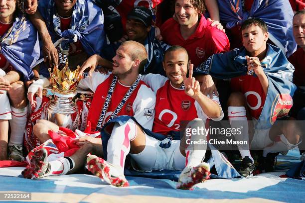 Thierry Henry of Arsenal celebrates winning the Premiership during the FA Barclaycard Premiership match between Arsenal and Leicester City at...