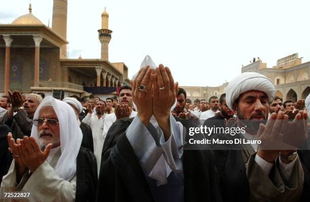 Muslim Shias gather for the Friday prayer at the Kadhimain Mosque April18, 2003 in Baghdad, Iraq. Most of Iraqi Muslims are either Sunnis or Shias,...