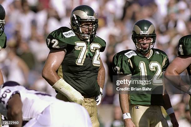 Quarterback Ryan Eslinger and offensive lineman Anthony Cesario of the Colorado State Rams look on during the game against the TCU Horned Frogs at...