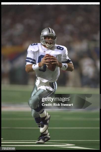 Quarterback Troy Aikman of the Dallas Cowboys looks to pass the ball during the fourth quarter of Super Bowl XXVIII against the Buffalo Bills at the...