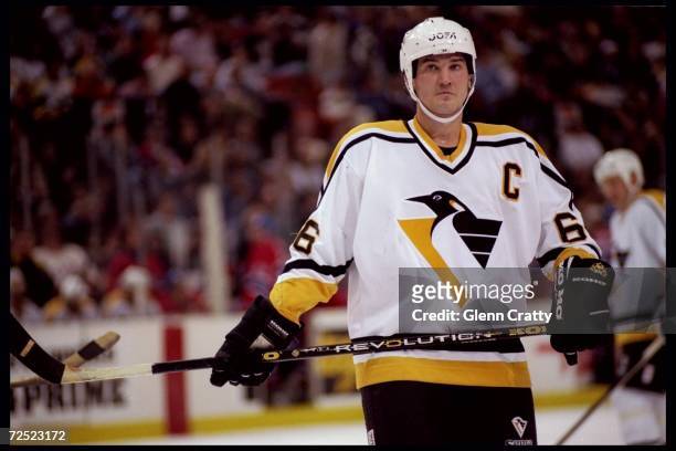 Center Mario Lemieux of the Pittsburgh Penguins looks on during a game against the Montreal Canadiens played at the Civic Arena in Pittsburgh,...