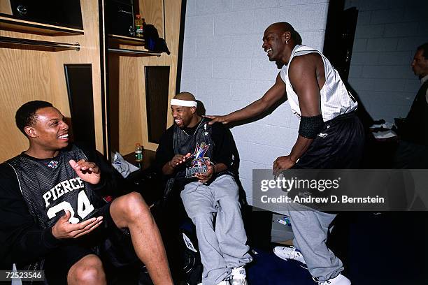 Paul Pierce of the Boston Celtics, Baron Davis of the Charlotte Hornets and Michael Jordan of the Washington Wizards during practice before the 2002...