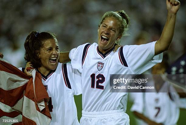 The womens soccer team from the USA celebrate their 2-1 victory over China to take the gold medal at Sanford Stadium in Athens, Georgia at the 1996...