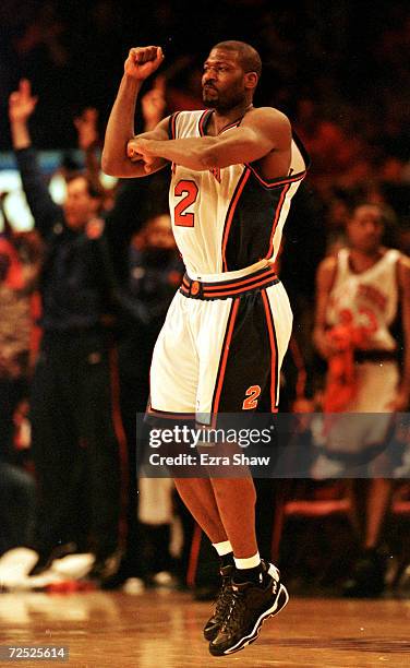 Larry Johnson of the New York Knicks celebrates after he hit a three-point basket to give the Knicks a 88-85 over the Toronto Raptors at Madison...