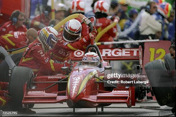 Alex Zanardi/ITA of team Target/Chip Gnassi and driver of the Reynard Honda 98I looks on during the Detroit Grand Prix in Detroit, Michigan.