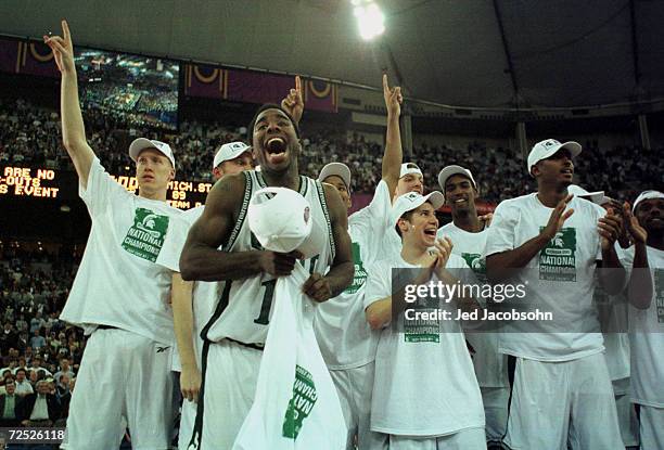 Mateen Cleaves of Michigan State celebrates with his teammates after defeating Florida 89-76 to win the final round of the NCAA Men''s Final Four at...