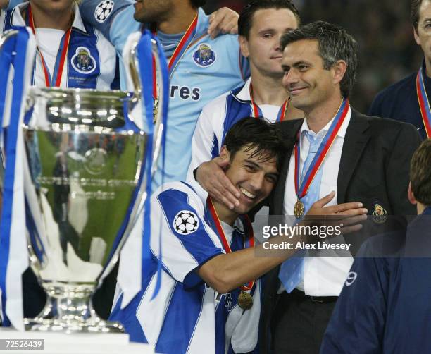 Nuno Valente of FC Porto hugs his manager Jose Dos Santos Mourinho after winning the Champions League during the UEFA Champions League Final match...