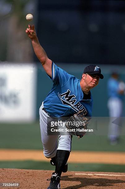 Pitcher Josh Beckett of the Florida Marlins pitches the ball during the Spring Training Game against the Kansas City Royals at Baseball City Stadium...