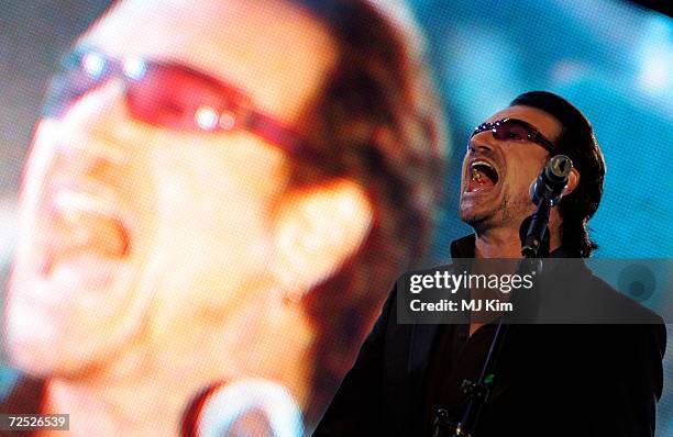 Bono performs on stage at the Live 8 Edinburgh concert at Murrayfield Stadium on July 6, 2005 in Edinburgh, Scotland. The free gig, labelled...