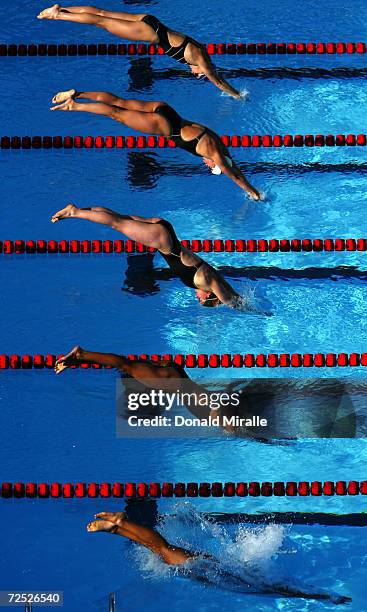 General view of competitors enterinf the water on the start of the Women's 100M Breaststroke Finals at the Janet Evans Invitational on June 13, 2004...