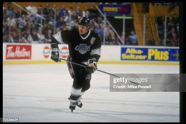 Center Wayne Gretzky of the Los Angeles Kings moves down the ice during a game against the Buffalo Sabres at Memorial Auditorium in Buffalo, New...