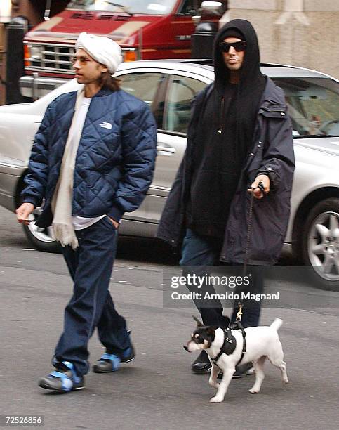 Fashion Photographer Steven Meisel and unidentified boyfriend walk Meisels dog March 9, 2002 along Madison Avenue in New York City.