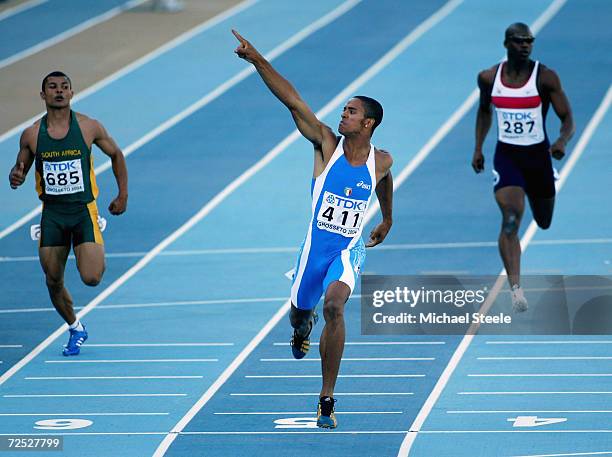 Andrew Howe Besozzi of Italy celebrates his victory from Leigh Julius of South Africa and Julian Thomas of Great Britain during the men's 200m final...