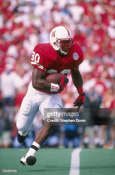 Running back Ahman Green of the Nebraska Cornhuskers looks up field as he makes a cut to the outside during a carry in the Cornhuskers 55-14 victory...