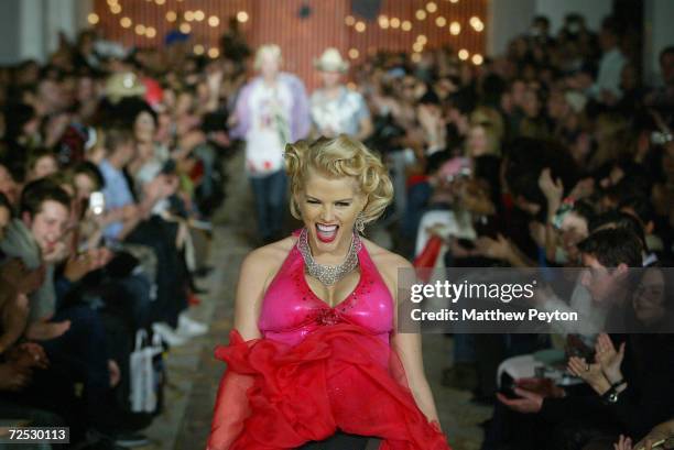 Anna Nicole Smith walks the runway at the Heatherette fashion show on February 12, 2004 during Olympus 2004 Fashion Week, in New York City.